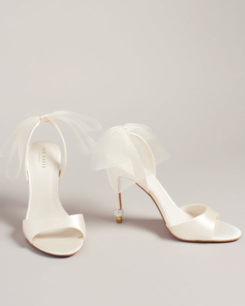 HARINAA-Sandals-Pay attention to the details with HARINAA. These satin sandals are crowned wth a double mesh organza bow at the back and crystal embellishment on the stiletto heels for dazzling elegance. Heeled sandals Oversized mesh ankle bow Satin finish Open toe Slim toe strap Crystal embellished heel detail Slingback design- Ted Baker Romania